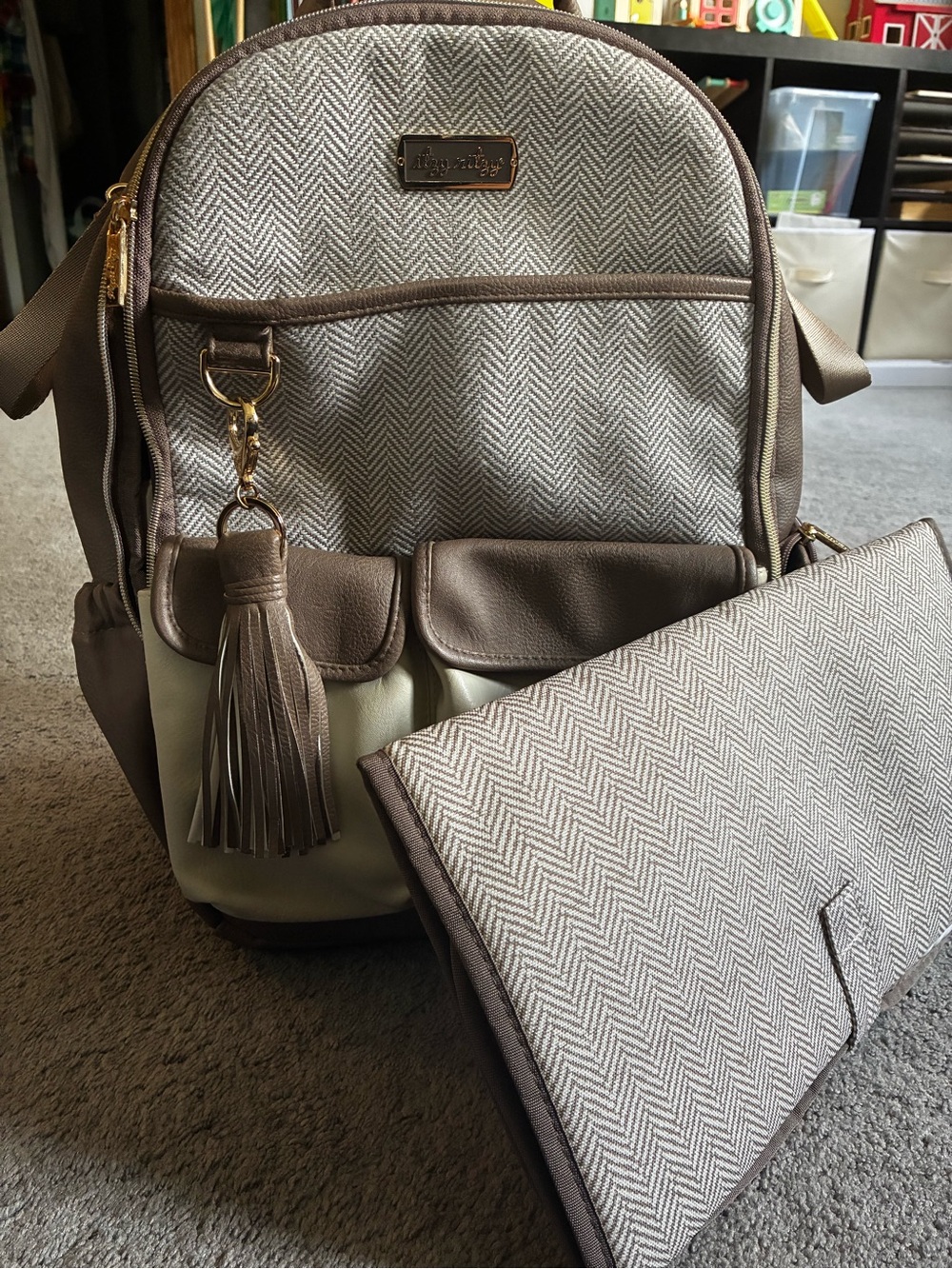 Itzy Ritzy Taupe Herringbone and Cream Diaper Backpack with Tassel